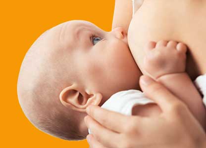 woman breastfeeding a baby